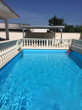 Villa with pool in Punta Prosciutto, 120 m², play area